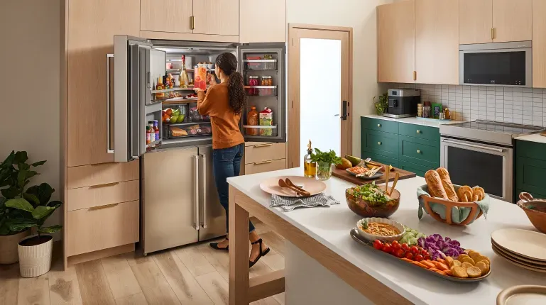 kitchenaid-open-refrigerator-woman